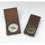 A 19th century wooden cased compass, with pivoting latch, small pin stop button to the inside of the