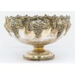 A Victorian silver plated large punch bowl, with large bunches of grapes and vine decoration to