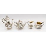 Militaria Interest: An early Victorian four piece silver tea and coffee service including teapot,