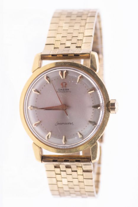 Omega- a gentleman's 18ct gold Omega Automatic Seamaster, circa 1960's, comprising a silvered signed