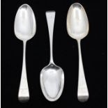 A set of three George III Old English Pattern silver table spoons, each engraved with a crest,