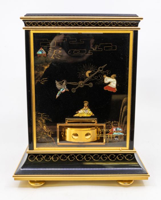 A Jaeger-LeCoultre "Marina" Atmos, the perspex case decorated in the Japanned manner with pagoda,