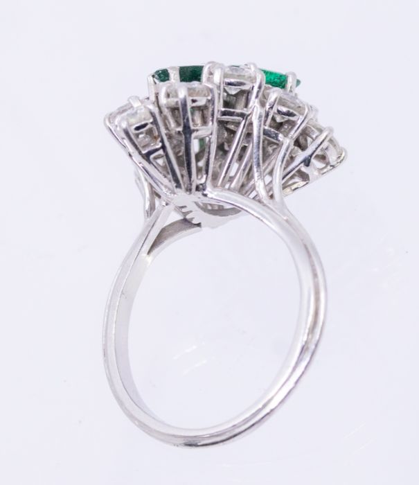 ***AUCTIONEER TO ANNOUNCE SMALL CHIP TO ONE EMERALD*** An emerald and diamond 18ct white gold - Image 2 of 4