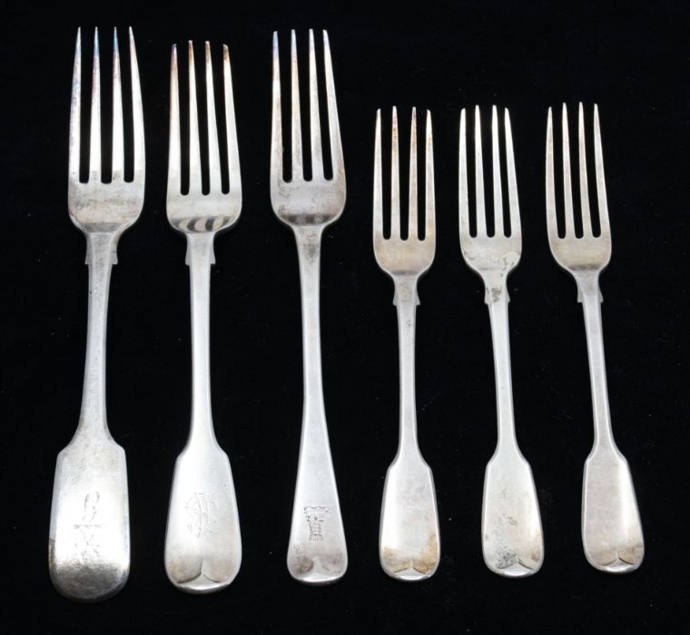 A collection of fiddle pattern silver forks to include; a trio of London, 1830, William Chawner