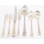 A Modern silver beaded Old English pattern flatware service consisting of eight soup spoons, eight