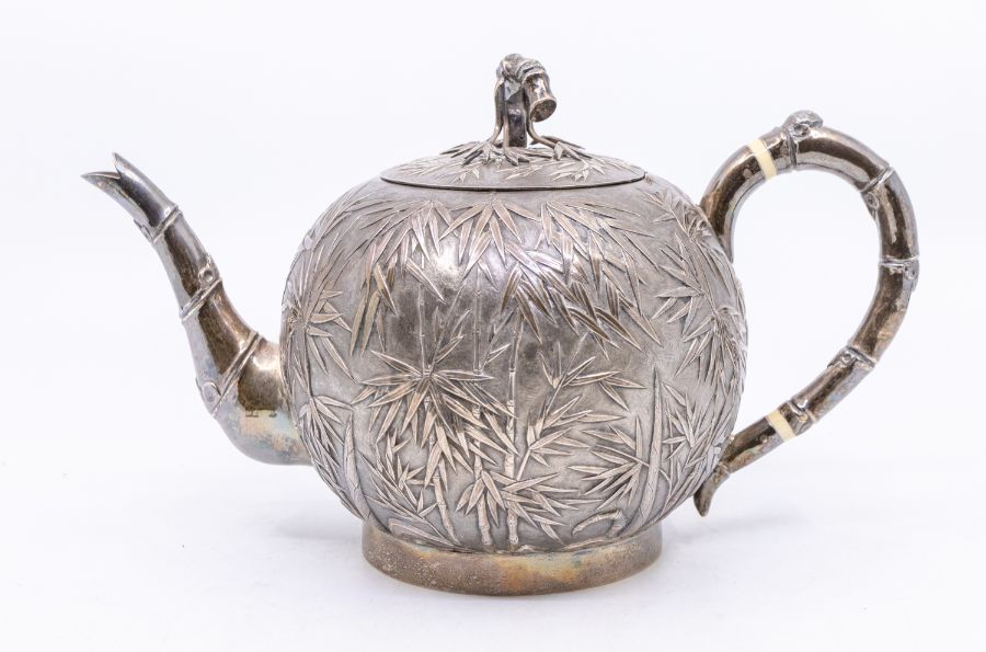 An early 20th Century Chinese Export silver three piece tea service and matching sugar tongs, - Image 3 of 4