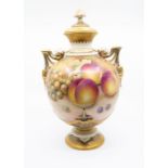 A Royal Worcester large vase and cover, shape no: 1691, the globular body painted with fallen fruits