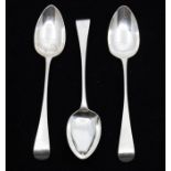 A set of three set George III Hanoverian silver table spoons, each engraved with a crest, hallmarked