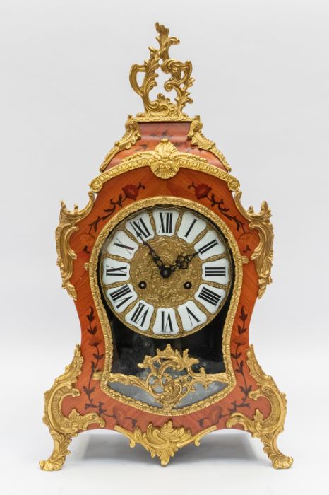 A modern French boulle style reproduction mantle clock with two train Franz Hermle movement,