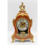 A modern French boulle style reproduction mantle clock with two train Franz Hermle movement,