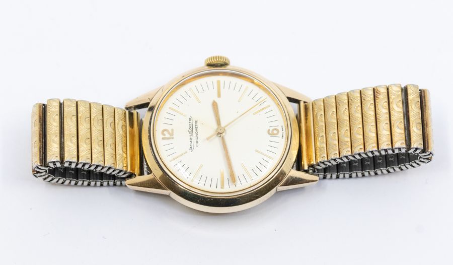 Jaeger Le Coultre- a vintage gents 9ct gold Chronometre Geophysic wristwatch, signed round cream