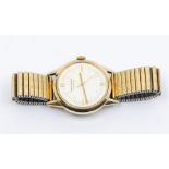 Jaeger Le Coultre- a vintage gents 9ct gold Chronometre Geophysic wristwatch, signed round cream