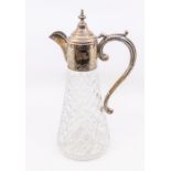 A Modern silver mounted glass claret jug, engraved collar, domed hinged cover and scroll handle,
