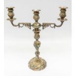 An early 20th Century silver plate large candelabra, detachable plain drip pans, above chased urn