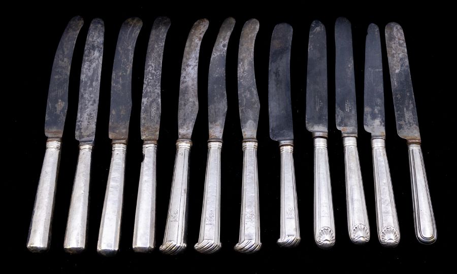 A collection of Georgian silver handled steel bladed knives, various types of knife, lion passant