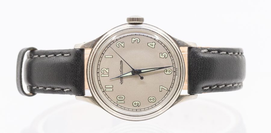 Jaeger LeCoultre- a gents 1940's steel cased wristwatch, comprising a silver dial with painted lume,