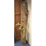 An early 20th century large brass and metal Water Pump with  plaque, dated 1914, length approx 70''