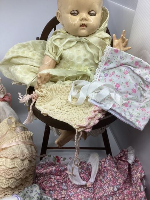 Vintage dolls cradle high chair, pedigree doll and lots of knitted baby doll clothes and velour baby - Image 3 of 5