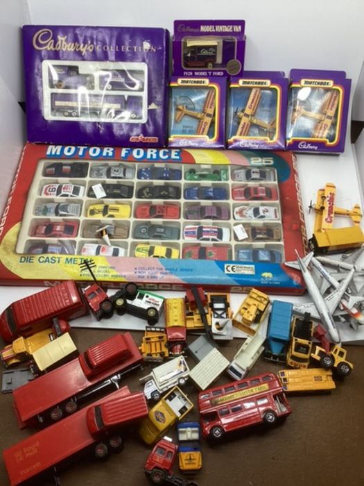 Vintage diecast boxed cars set and Cadbury’s vehicles and crunchue aircraft and a selection of