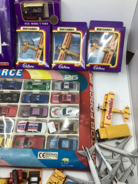 Vintage diecast boxed cars set and Cadbury’s vehicles and crunchue aircraft and a selection of - Image 4 of 5
