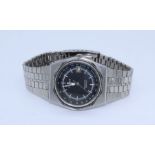 A Tissot Seastar quartz gentleman's wristwatch - appears to be running. Black dial with silver