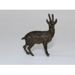 A small Austrian cold painted bronze goat, in the manner of Franz Bergman, 6cm high