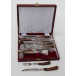 A set of Francis Howard Ltd stainless steel steak knives and forks with bone handles