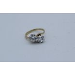 A cubic zirconia toi et moi 9ct gold ring, size O 1/2. Gross weight approximately 3.5gm