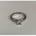 An estimated 0.55ct diamond solitaire ring in 18ct gold. Featuring a radiant cut square shaped