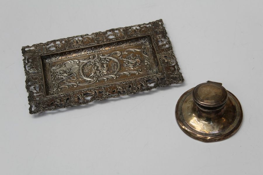 A late 19th century Continental silver dressing table tray of pierced rectangular form, embossed