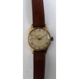 A 1950's Smiths Deluxe seventeen jewels wristwatch. With engraving of Rotol Ltd 1937-1957 to the