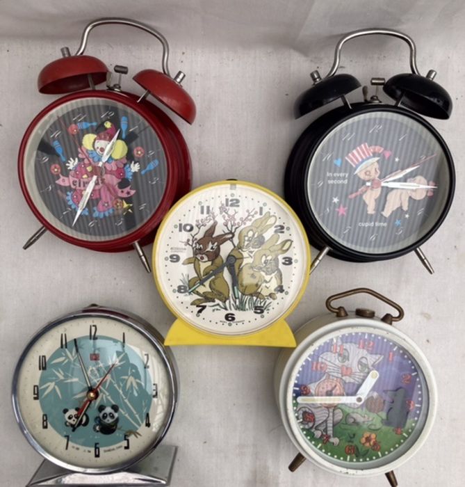 Alarm Clocks: A collection of five vintage animated alarm clocks to comprise: Diamond Shanghai