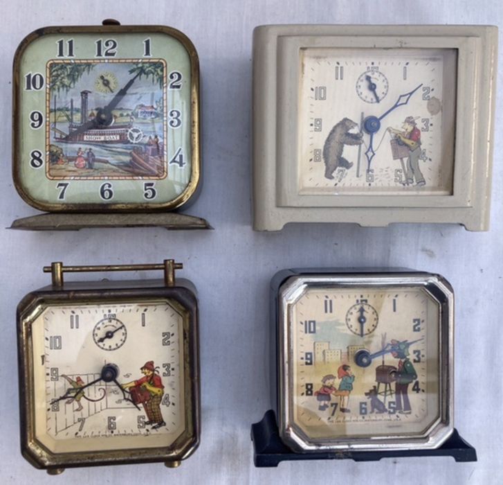 Clocks: A collection of four vintage animated alarm clocks, to comprise: Lux of USA. Includes Show