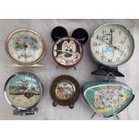 Clocks: A collection of six vintage animated alarm clocks to include: Mickey Mouse, Windmill Scenes,