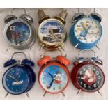 Clocks: A collection of novelty Alarm Clocks, to comprise: E.T, DAF Truck, Simpsons, Ghostbusters,