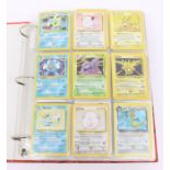 Pokemon: A large collection of assorted Pokemon cards, ranging from Wizards of the Coast 1999