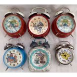 Clocks: A collection of six novelty alarm clocks, to comprise: two Bugs Bunny examples, A Team, Mr