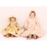 Armand Marseille: A pair of Armand Marseille bisque head dolls, both with jointed composition