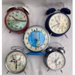 Alarm Clocks: A collection of five assorted vintage animated alarm clocks, to comprise: Kiki