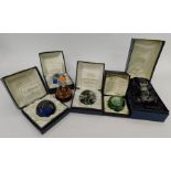 A large collection of boxed Caithness paperweights