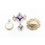 A collection of 19th Century mourning jewellery to include a Victorian brooch with half pearl and