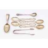 A small collection of silver flatware to include; A pair of Sheffield silver sugar tongs by Walker &