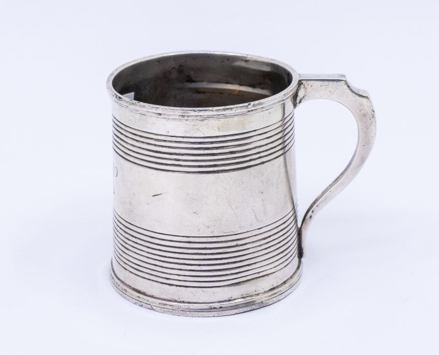 A William IV silver christening mug with reeded decoration , with later engraved inscription to base