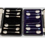 A cased set of six stylised Art Deco style enamelled coffee spoons, hallmarked Birmingham, 1948,