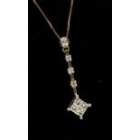 A diamond and 14ct gold pendant, comprising a squared illusion setting set with four princess cut