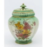 A Royal Worceter pot pourri and cover, shape no: 1314, green ground decorated with bouquet of