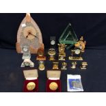 Collection of miniature clocks, glass mantle clock and commemorative coins