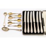 A collection of silver to include; A cased set of six silver handled steel bladed spreading