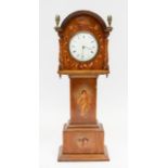 An early 20th century miniature longcase mantel clock with painted detail and Roman and Arabic