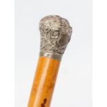 An early 20th century silver-topped walking cane
